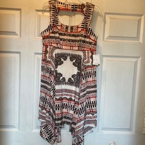 Jessica Simpson dress.. orange, cream and black with tiered bottom..  size 10